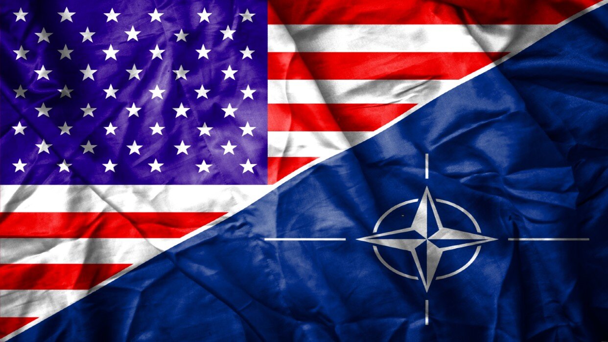 Rectangle cut down the diagonal between the US flag on the left and the NATO flat on the right