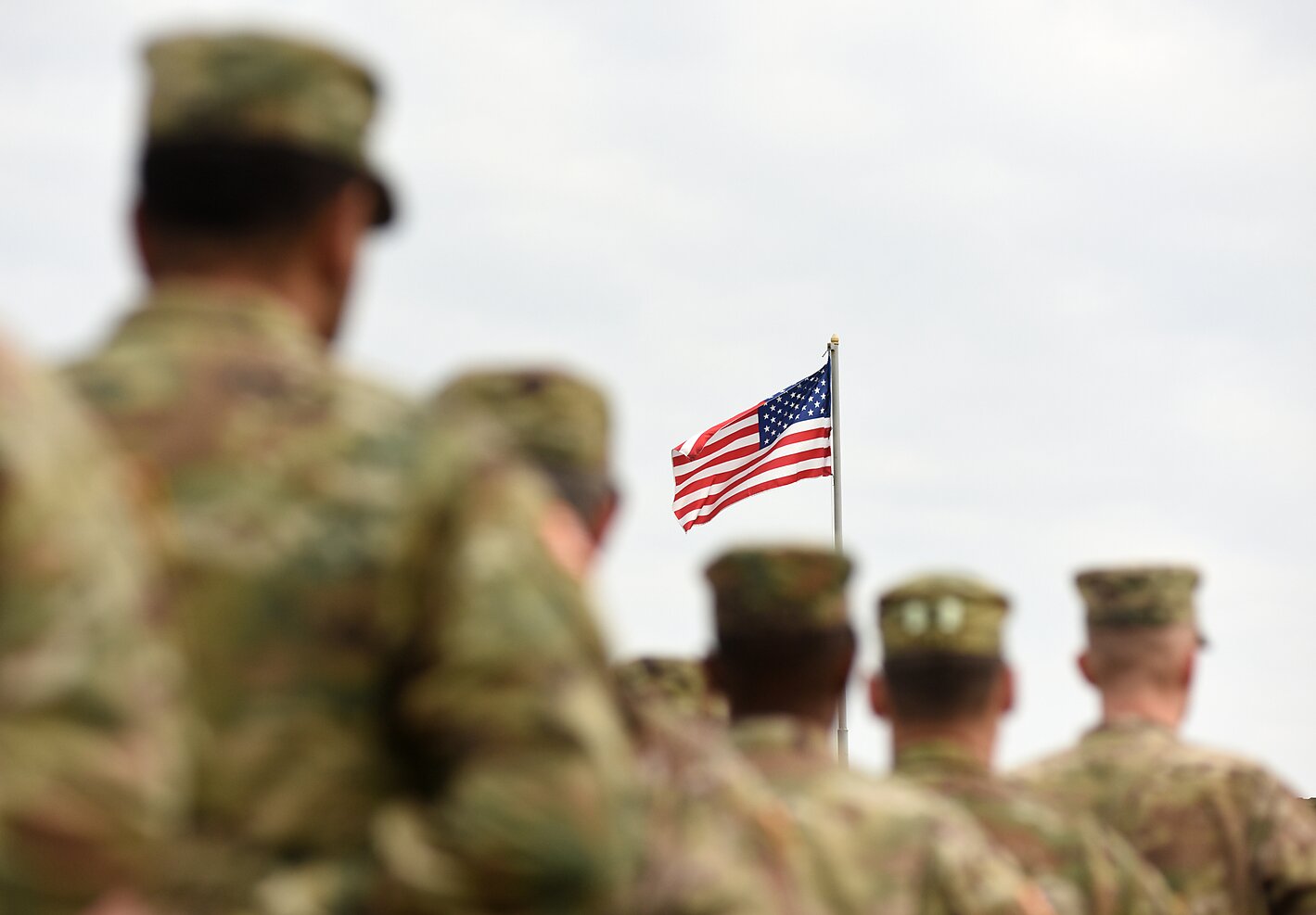 US Troops with an American Flag