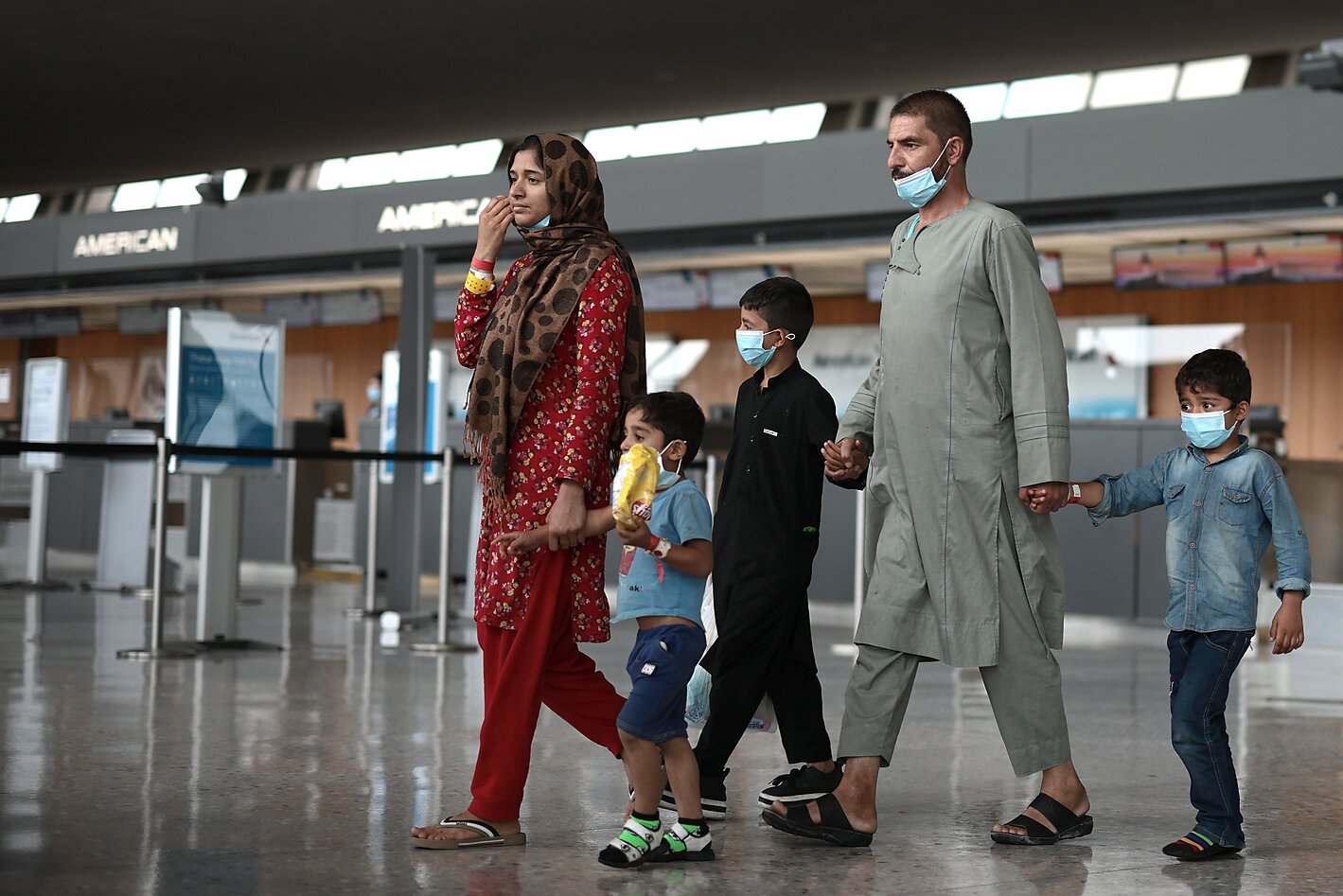 Afghan family arriving at Dulles International Airport