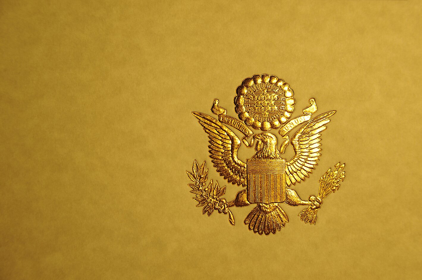 A gold US Presidential seal