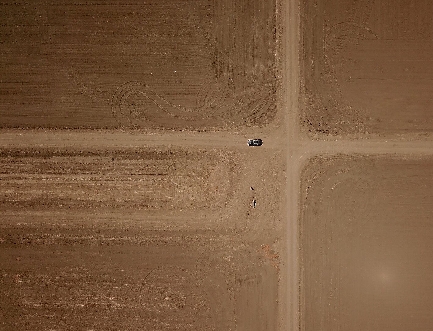 Barren fields once sown with row crops are seen, July 23, 2021 on a farm in the town of Huron, California in the drought-stricken Central Valley