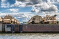 Military vehicles at a port for export.