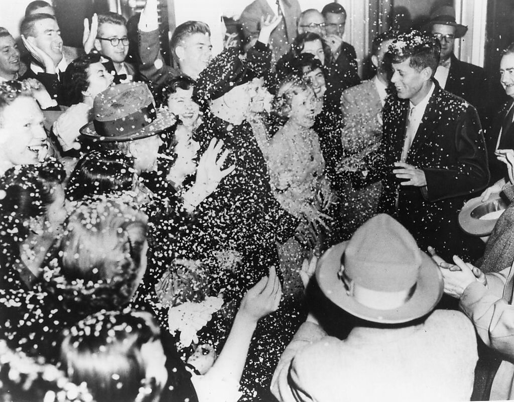 A crowd celebrates JFK's senate win