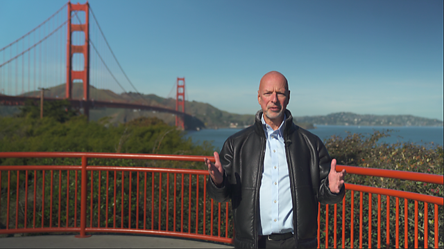 Michael Tanner standing in front of the Golden Gate Bridge