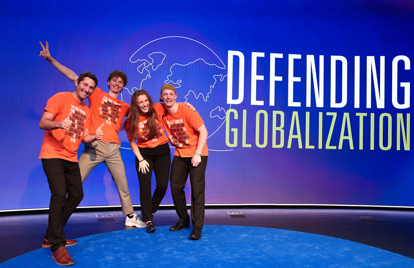 Picture of young people wearing Cato's Defending Globalization t-shirt